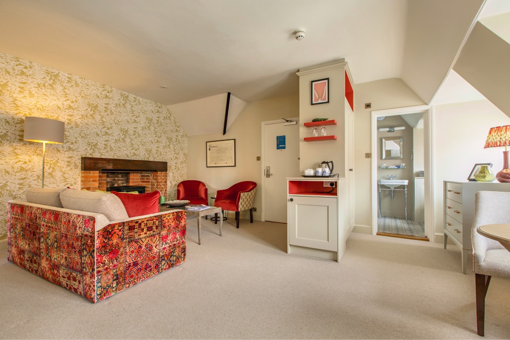 The suite's lounge with a patterned sofa